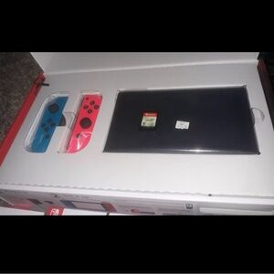 Nintendo Switch Console with Vibrant Red and Blue Joy-Con